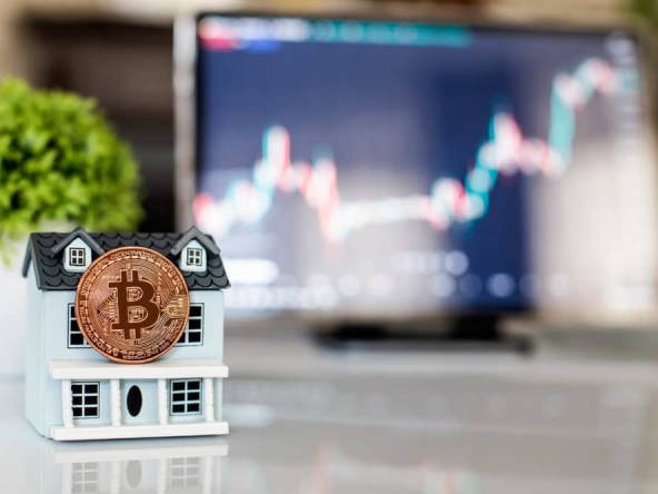 Buying,Real,Estate,Through,Cryptocurrency,,Bitcoin,Coin,On,A,House